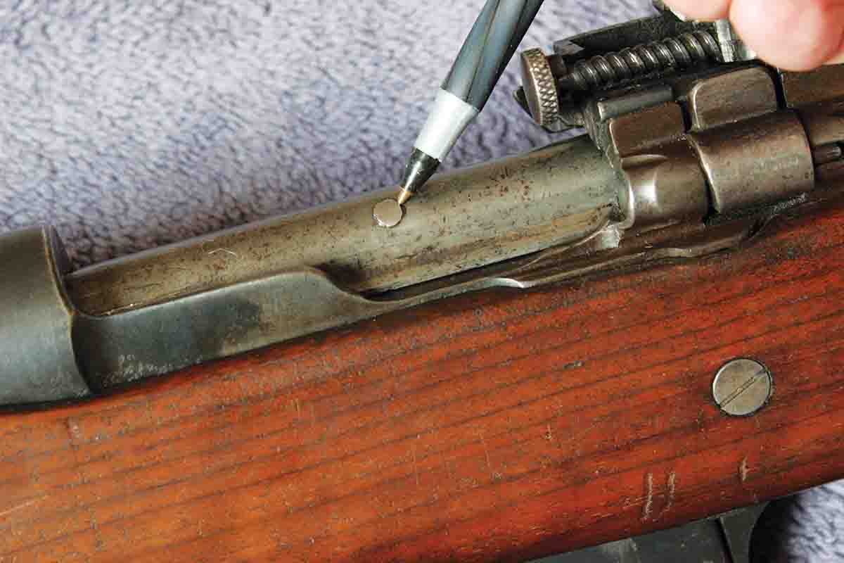 After the potential problem with reassembled bolts was discovered, many were riveted to prevent it from happening, including the bolt on John’s rifle.